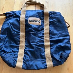 Faberge Blue and Tan Duffel Bag